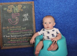J with his 5 month chalkboard :)